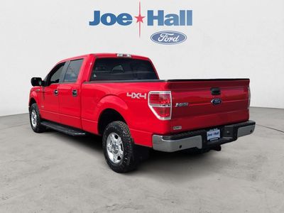 2014 Ford F-150 — rear three-quarter view