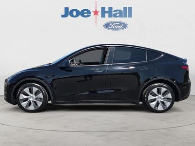 2023 Tesla Model Y — side profile view