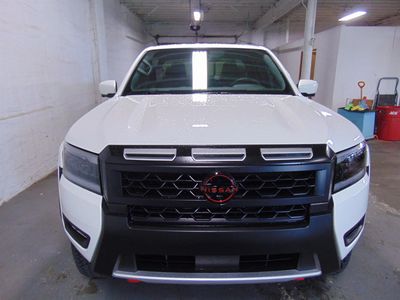 2026 Nissan Frontier — rear three-quarter view