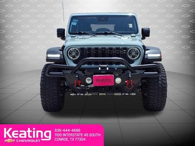 2024 Jeep Wrangler — rear three-quarter view