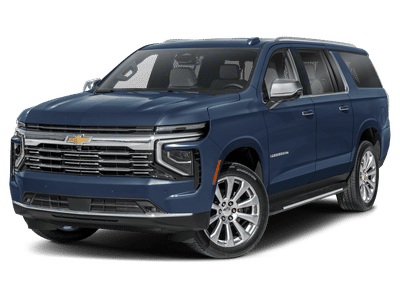 2025 Chevrolet Suburban Premier in Dark Ash Metallic — front three-quarter view