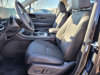 2026 Kia Carnival — rear three-quarter view