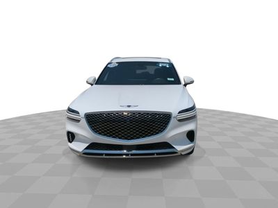 2024 Genesis GV70 — rear three-quarter view
