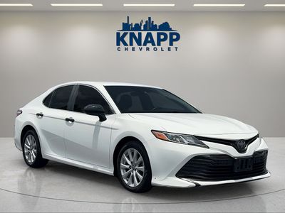 2018 Toyota Camry — rear three-quarter view