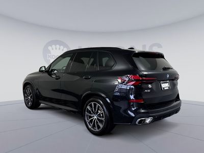 2025 BMW X5 — rear three-quarter view