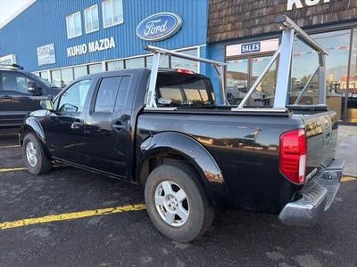 2006 Nissan Frontier — rear three-quarter view