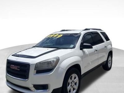 2015 GMC Acadia — rear three-quarter view