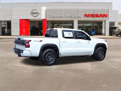 2026 Nissan Frontier — rear three-quarter view