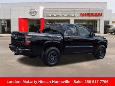 2024 Nissan Frontier — rear three-quarter view