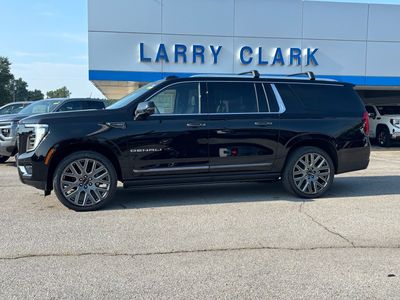 2026 GMC Yukon XL — rear three-quarter view