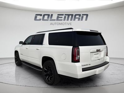 2018 GMC Yukon XL — rear three-quarter view