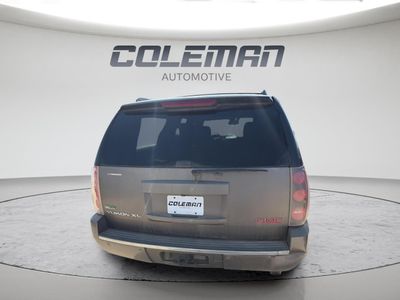 2011 GMC Yukon XL — rear three-quarter view