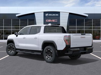 2026 GMC Sierra EV — rear three-quarter view