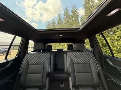 2026 GMC Acadia — rear three-quarter view