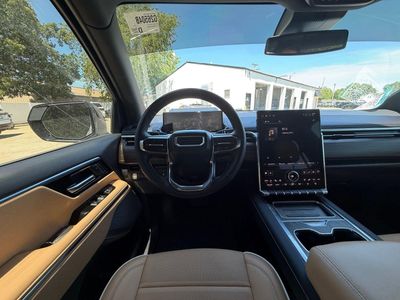 2026 GMC Sierra EV — side profile view