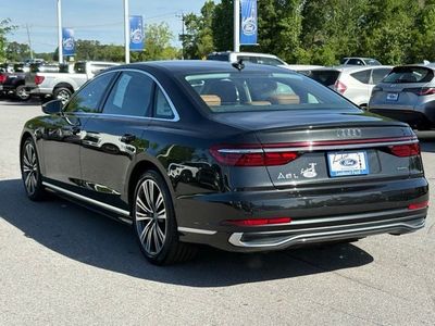 2023 Audi A8 — rear three-quarter view