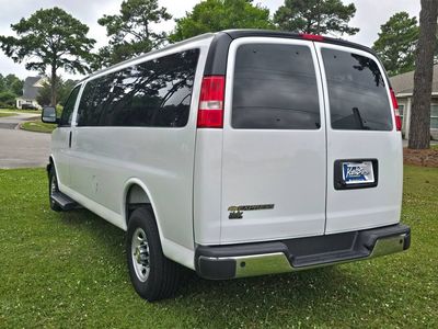 2025 Chevrolet Express Passenger — rear three-quarter view