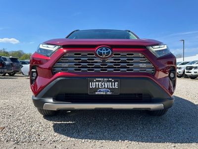 2025 Toyota RAV4 Hybrid — rear three-quarter view