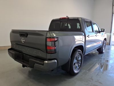 2026 Nissan Frontier — rear three-quarter view
