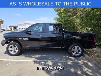2014 RAM 1500 — rear three-quarter view