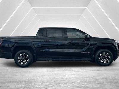 2026 GMC Sierra EV — rear three-quarter view