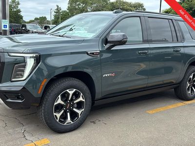 2026 GMC Yukon XL — rear three-quarter view
