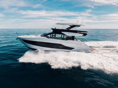 2026 Cruisers Yachts 57 FLY — front three-quarter view