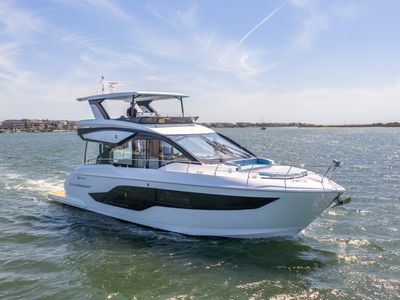 2026 Cruisers Yachts 50 FLY — front three-quarter view
