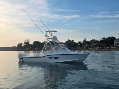 2005 Ocean Master 31 EXPRESS SPORT CABIN — front three-quarter view