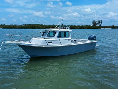 2024 Parker Marine 2320 SPORT CABIN — front three-quarter view