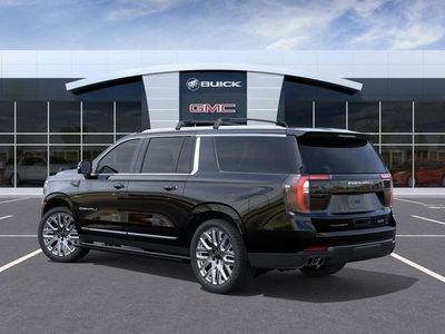 2026 GMC Yukon XL — rear three-quarter view