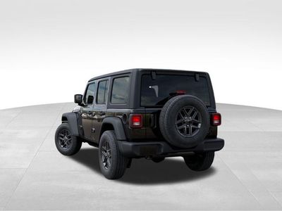 2026 Jeep Wrangler — rear three-quarter view