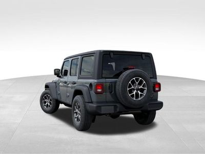 2026 Jeep Wrangler — rear three-quarter view