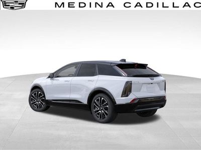 2026 Cadillac OPTIQ — rear three-quarter view