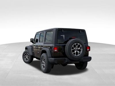 2026 Jeep Wrangler — rear three-quarter view