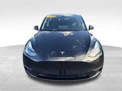 2023 Tesla Model Y — side profile view