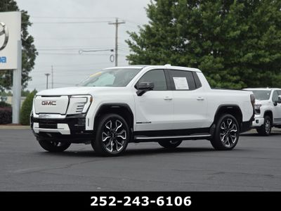 2026 GMC Sierra EV — rear three-quarter view