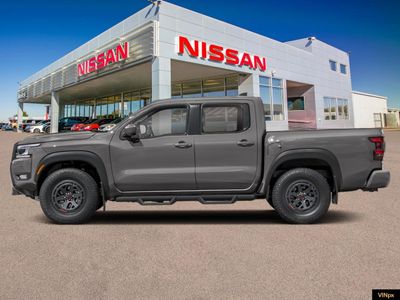 2026 Nissan Frontier — rear three-quarter view