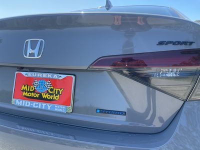 2026 Honda Civic Hybrid — rear three-quarter view