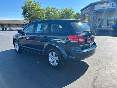2013 Dodge Journey — rear three-quarter view