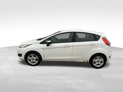2015 Ford Fiesta — rear three-quarter view