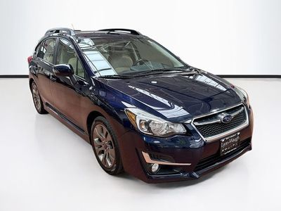 2015 Subaru Impreza — rear three-quarter view