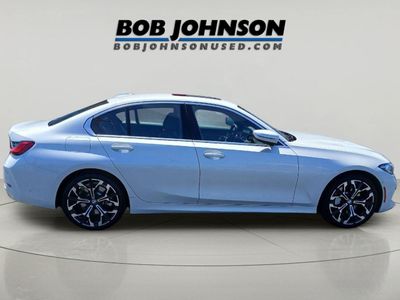 2025 BMW 330i — side profile view