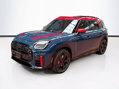 2027 MINI COUNTRYMAN ICONIC in Indigo Sunset Blue Metallic — front three-quarter view