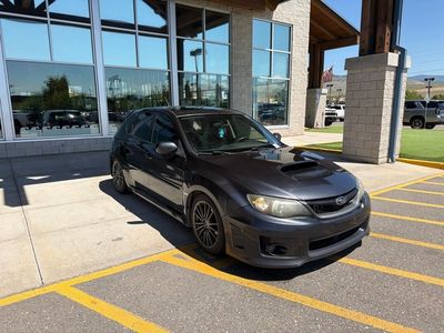 2011 Subaru Impreza WRX — rear three-quarter view