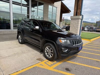 2015 Jeep Grand Cherokee — rear three-quarter view