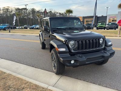 2026 Jeep Wrangler — rear three-quarter view