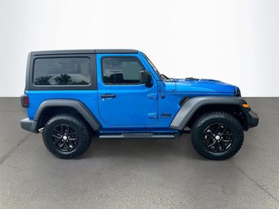 2023 Jeep Wrangler — rear three-quarter view