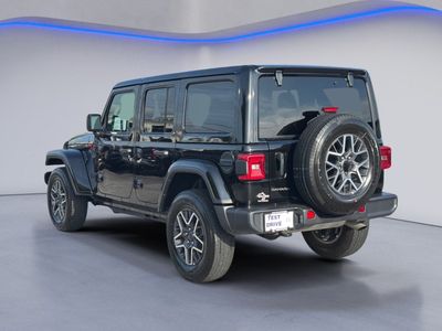 2025 Jeep Wrangler — rear three-quarter view