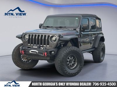 2020 Jeep Wrangler Unlimited Rubicon in Granite Crystal Metallic Clearcoat — front three-quarter view